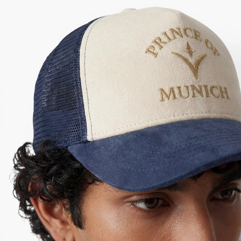 Worn · gold embroidery close-up